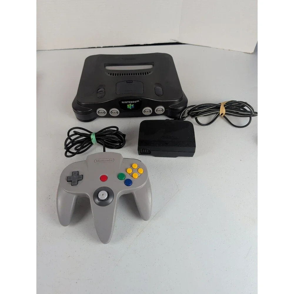 Nintendo 64 home video game console bundle. untested Powers On Read